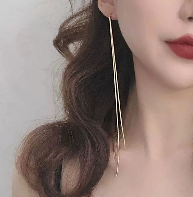 Платиновые длинные серьги с кисточками