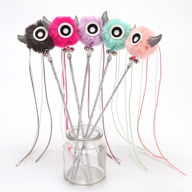 Cruz-frontera Venta caliente mascota gato juguete divertido gato palo grande ojo felpa bola borla campana gato divertido varilla diablo divertido gato palo