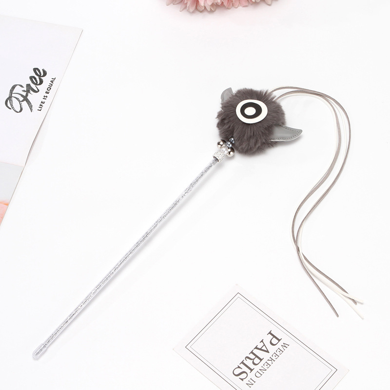 Cruz-frontera Venta caliente mascota gato juguete divertido gato palo grande ojo felpa bola borla campana gato divertido varilla diablo divertido gato palo