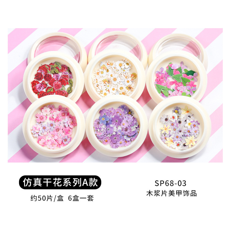 Conjunto de joyas de uñas populares transfronterizas nueva mariposa de uñas flor colorida flor seca lentejuelas desgaste joyería de uñas