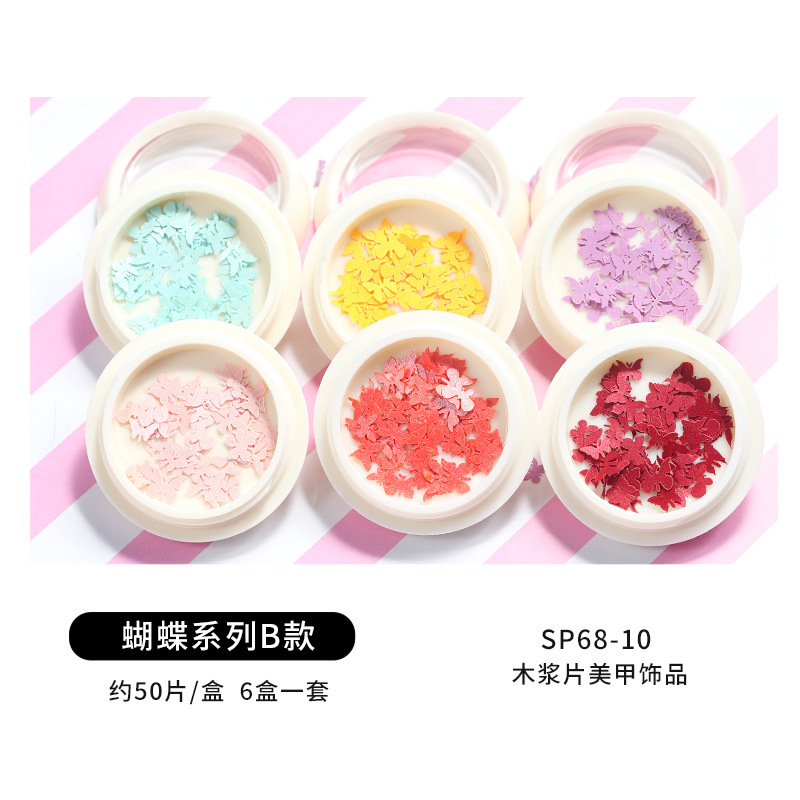 Conjunto de joyas de uñas populares transfronterizas nueva mariposa de uñas flor colorida flor seca lentejuelas desgaste joyería de uñas