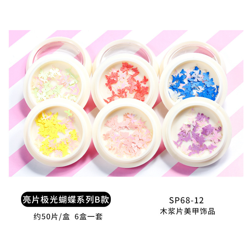 Conjunto de joyas de uñas populares transfronterizas nueva mariposa de uñas flor colorida flor seca lentejuelas desgaste joyería de uñas