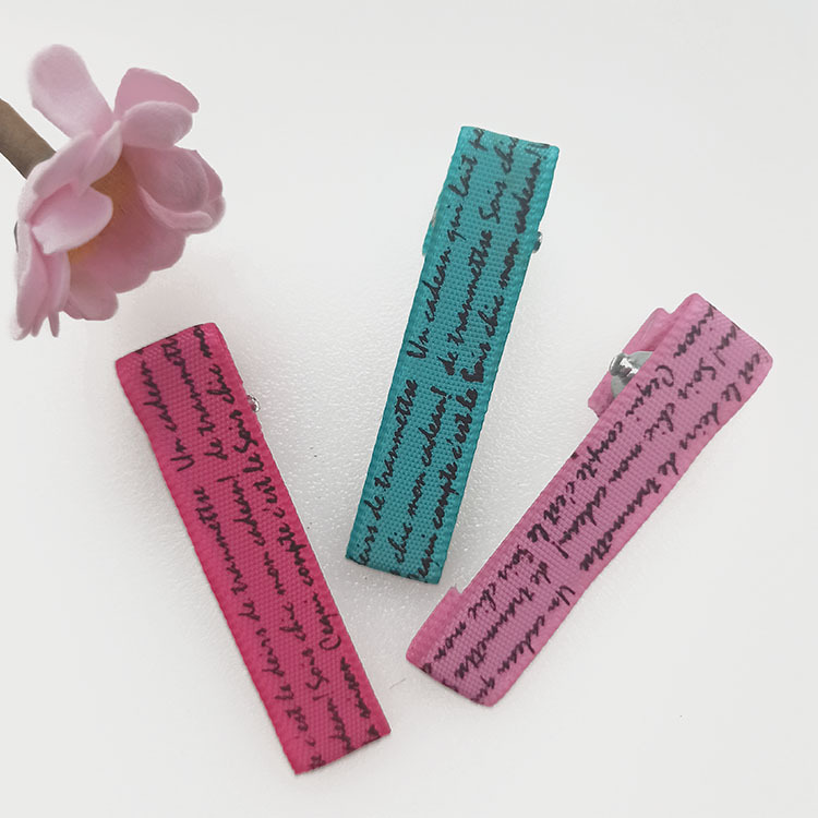 Geometric children's hairgrip with letters