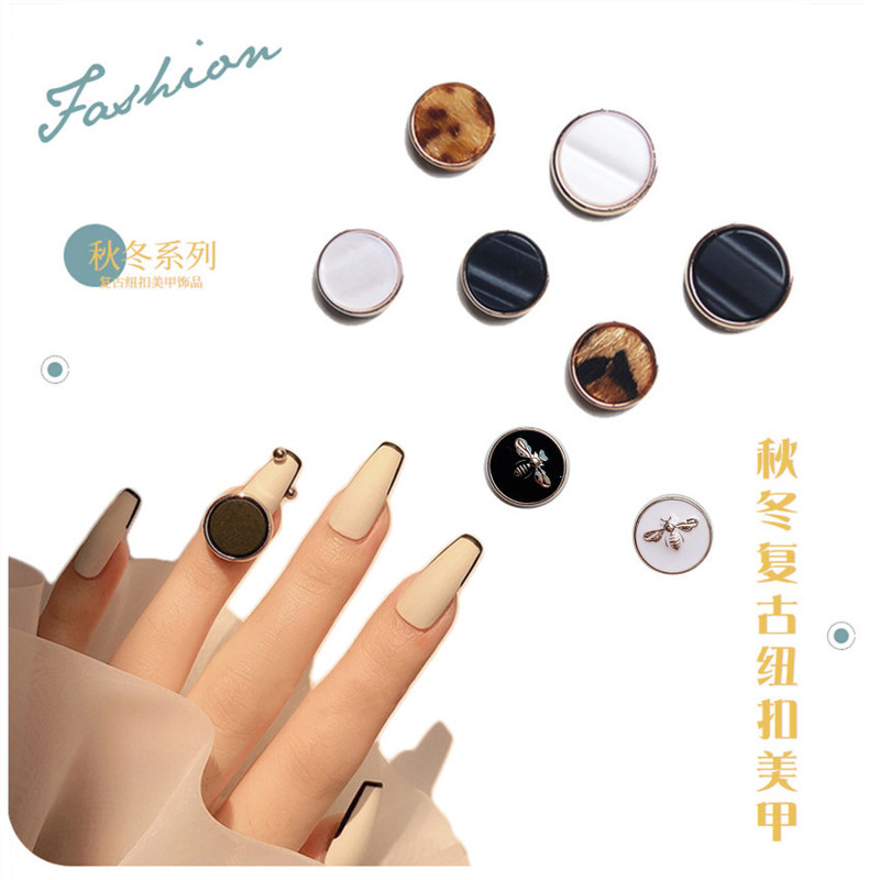 Factory direct 2022 autumn and winter new nail jewelry leopard metal edge honey front shell frame nail buttons