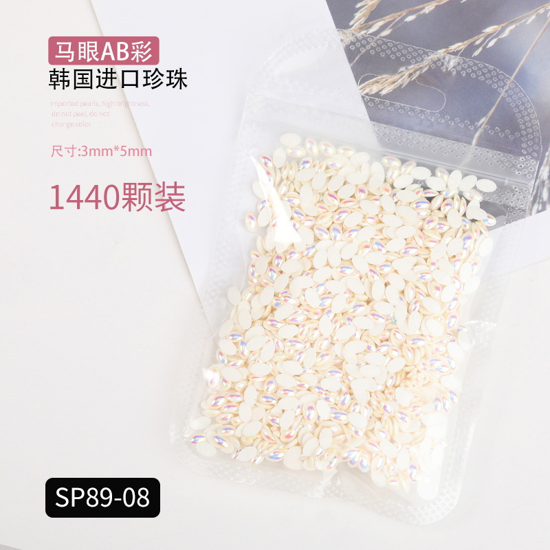 Popular celebridad en línea de fondo plano AB perla color mágico tamaño blanco semicírculo oval gota de agua de uñas de perlas joyería etiqueta engomada del clavo