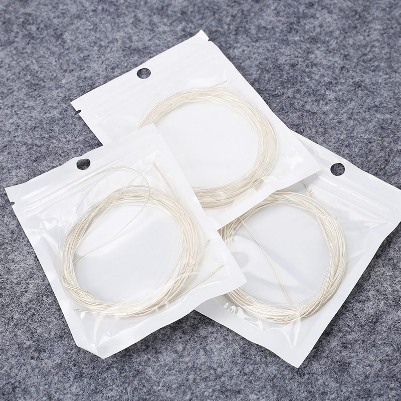 A granel guitarra clásica cuerdas de nylon fábrica al por mayor cadenas clásicas plateado fábrica cuerdas accesorios de guitarra