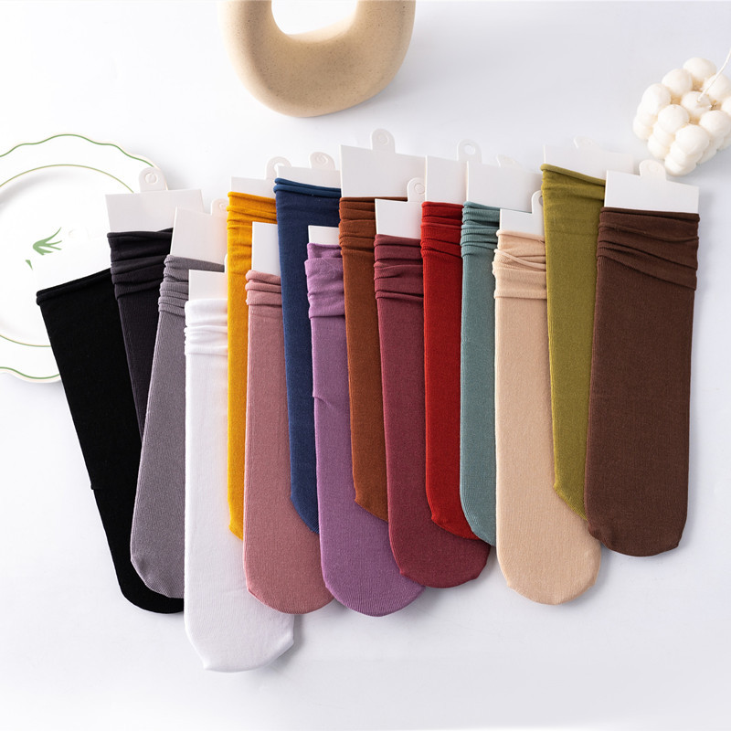 Calcetines de pila de mujer Calcetines de algodón liso de color sólido sin tacón calcetines de media pantorrilla en blanco y negro sin tacón boca suelta calcetines de confinamiento de mujeres embarazadas