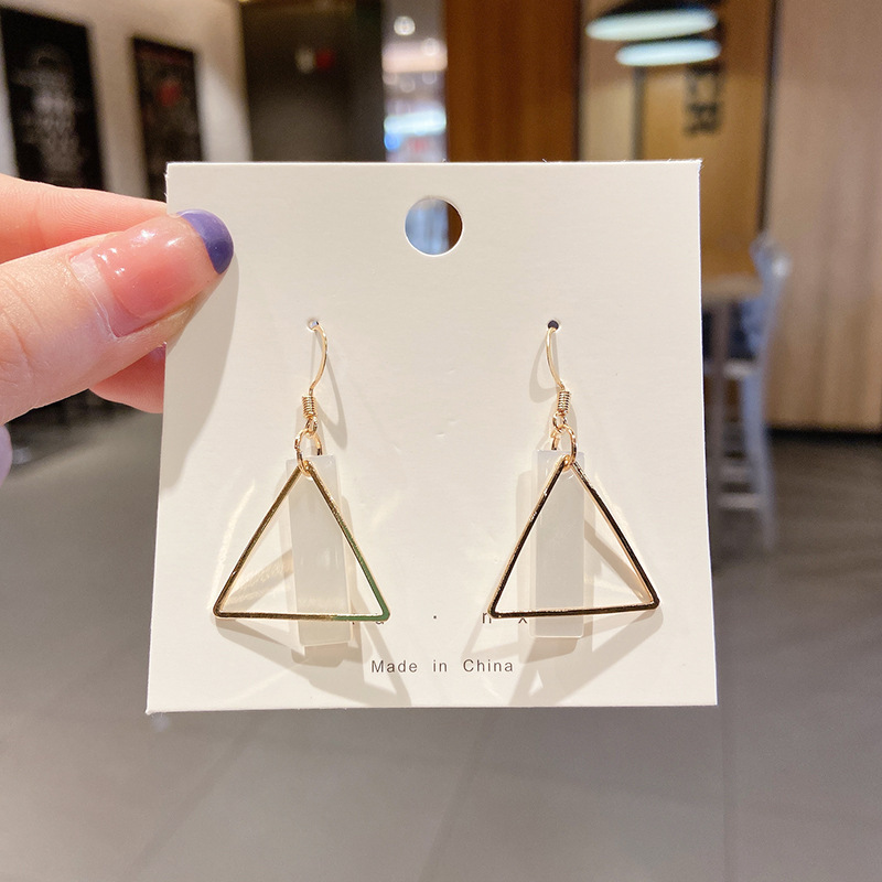 Corea del Sur ins simple borla elegante aretes para las mujeres europeos y americanos transfronterizos joyas pendientes vintage pendientes de estilo frío para las mujeres