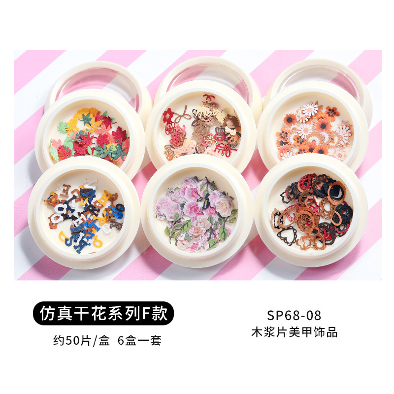 Conjunto de joyas de uñas populares transfronterizas nueva mariposa de uñas flor colorida flor seca lentejuelas desgaste joyería de uñas