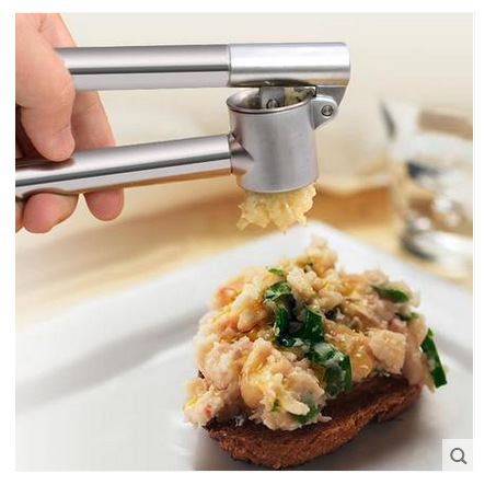 Taobao hot manual garlic press stainless steel garlic peeler garlic peeler kitchen household gadget factory wholesale