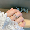 Fashionable retro small design ring, silver 925 sample, on index finger