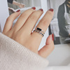 Retro fashionable ring, silver 925 sample, on index finger