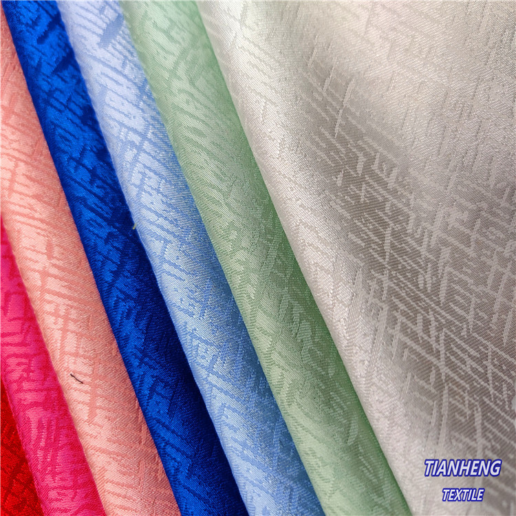 现货色丁小十字提花 时装男女装衬衫家居服吊带衫连衣裙面料批发