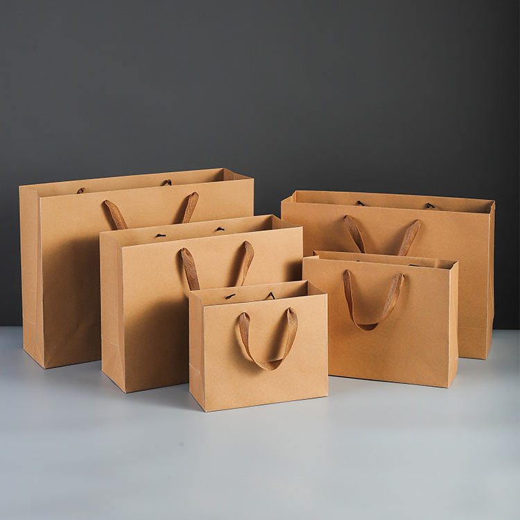Horizontal Kraft Paper Bags in Stock Wholesale Clothing Bags Kraft Paper in Stock Handbags Gift Bags Available Horizontal Kraft Paper Bags in Stock Wholesale Clothing Bags Kraft Paper in Stock Handbags Gift Bags Available