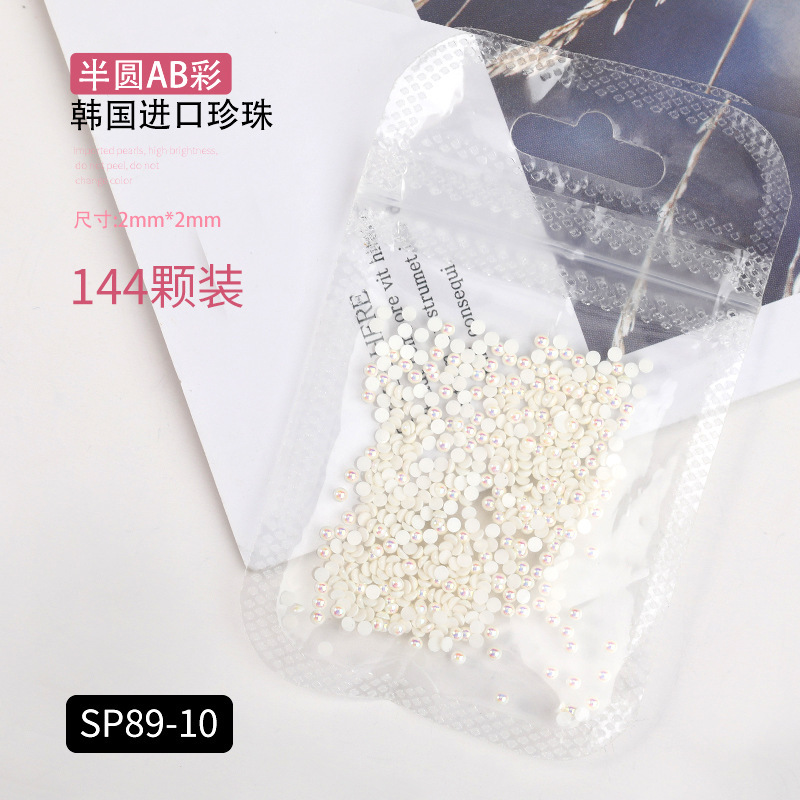 Popular celebridad en línea de fondo plano AB perla color mágico tamaño blanco semicírculo oval gota de agua de uñas de perlas joyería etiqueta engomada del clavo