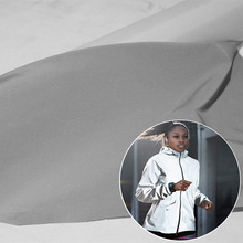 厂家供应柔软高亮反光化纤布风衣夹克耐水洗耐折银灰色反光面料