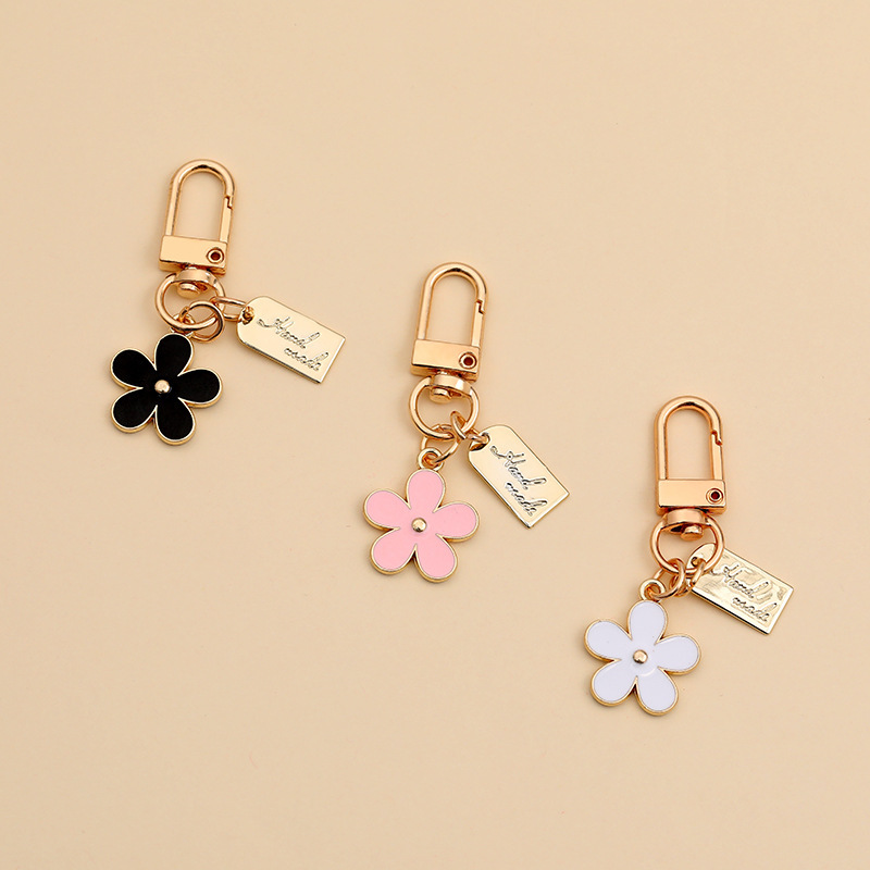 Korean ins Metal Daisy Keychain Niche Flower airpods Bluetooth Headset Protective Cover Accessories Pendant Korean ins Metal Daisy Keychain Niche Flower airpods Bluetooth Headset Protective Cover Accessories Pendant