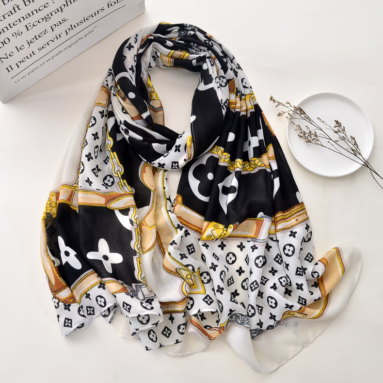 Otoño e invierno nueva cadena de moda europea y americana algodón y lino bufanda caliente Toalla de playa de las mujeres larga primavera y otoño delgada bufanda de estilo occidental