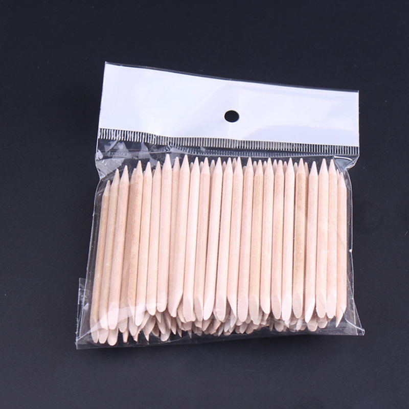 Fábrica directa manicure naranja barra de belleza doble cabeza 100 bolsas de 7,5 cm empuje punto de perforación de piel muerta en stock