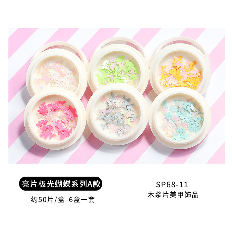 Conjunto de joyas de uñas populares transfronterizas nueva mariposa de uñas flor colorida flor seca lentejuelas desgaste joyería de uñas
