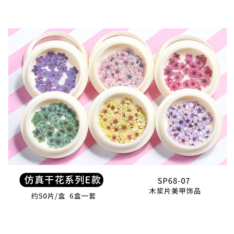 Conjunto de joyas de uñas populares transfronterizas nueva mariposa de uñas flor colorida flor seca lentejuelas desgaste joyería de uñas