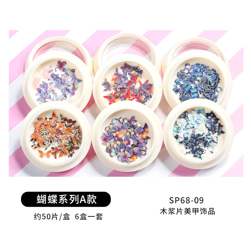 Conjunto de joyas de uñas populares transfronterizas nueva mariposa de uñas flor colorida flor seca lentejuelas desgaste joyería de uñas