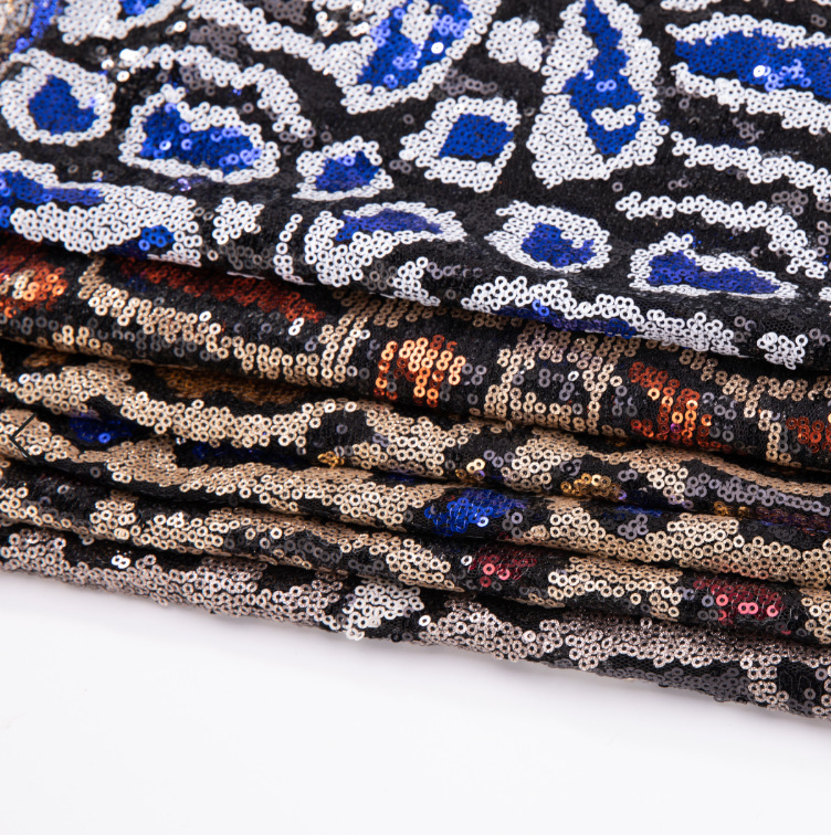 In-Stock 3mm Leopard Print Plain Transparent Iridescent Sequin Fabric, Fashionable Three-Dimensional Sequin Embroidery Fabric with a Shiny Finish In-Stock 3mm Leopard Print Plain Transparent Iridescent Sequin Fabric, Fashionable Three-Dimensional Sequin Embroidery Fabric with a Shiny Finish