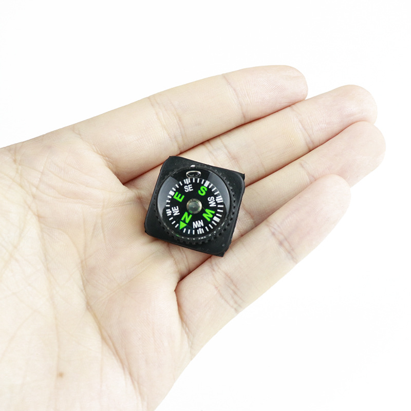 Ventas directas de la fábrica en stock 25mm plástico respetuoso del medio ambiente cubierta suave brújula pulsera al aire libre puntero aguja