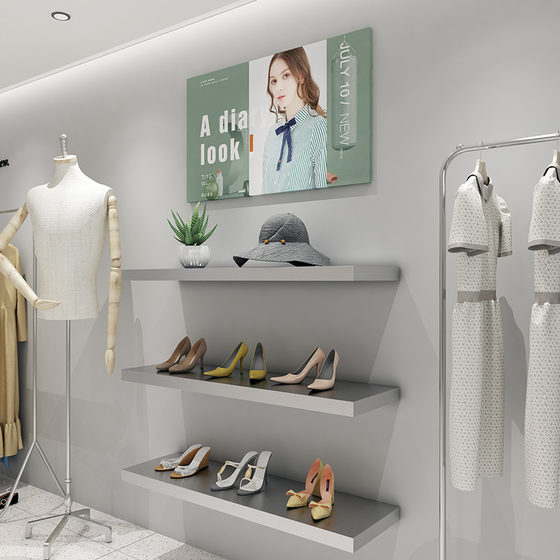 Estante de exhibición de la bolsa Tienda de ropa de pared Estante de sobres rojo neto Acero inoxidable cepillado Tienda de ropa de mujer Estante de exhibición de zapatos