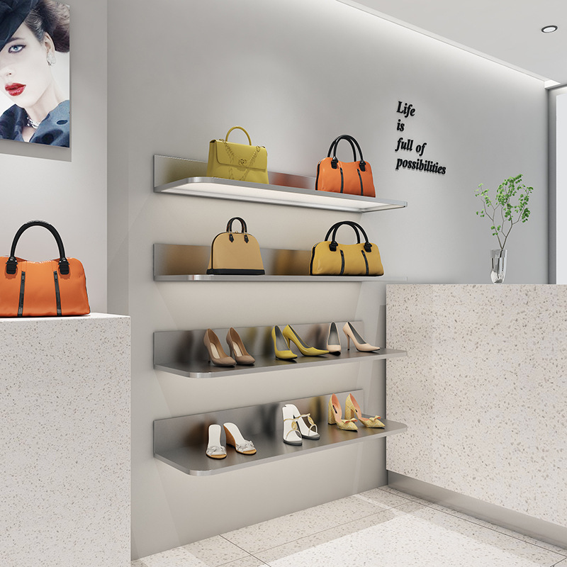 Estante de exhibición de la bolsa Tienda de ropa de pared Estante de sobres rojo neto Acero inoxidable cepillado Tienda de ropa de mujer Estante de exhibición de zapatos