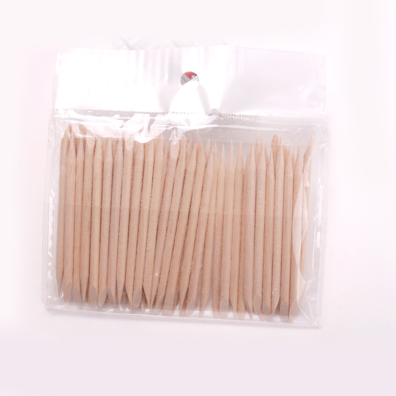 Fábrica directa manicure naranja barra de belleza doble cabeza 100 bolsas de 7,5 cm empuje punto de perforación de piel muerta en stock