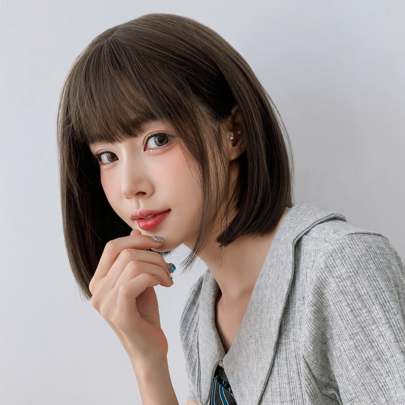 かつらの女性のショートヘアの韓国式boboの頭のかわいい漫画の前髪の丸い顔の少女の鎖骨の髪の全頭カバーの波の頭|undefined