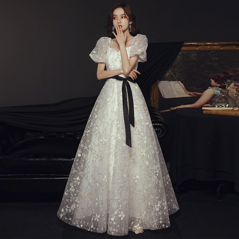Demi-season white evening dress