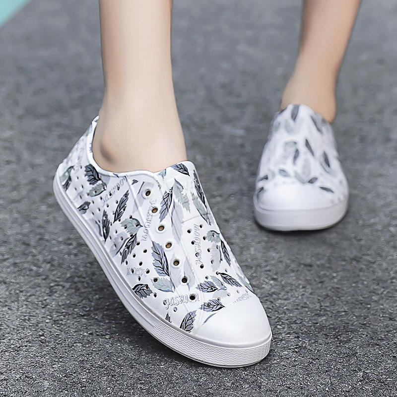 LUCHI zapatos con agujeros pareja verano nuevo estilo graffiti transpirable vadeo hueco hombres y mujeres sandalias de playa casuales en stock