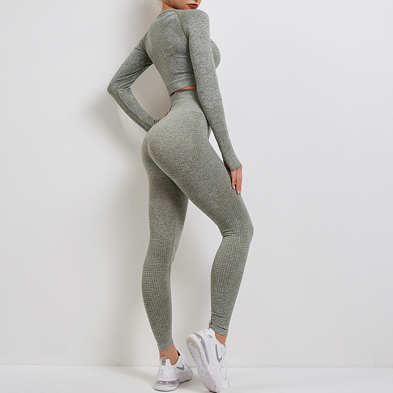 Conjunto deportivo de fitness, top de manga larga sin costuras, pantalones de yoga ajustados de estilo europeo y americano, adelgazantes, transpirables y de secado rápido.