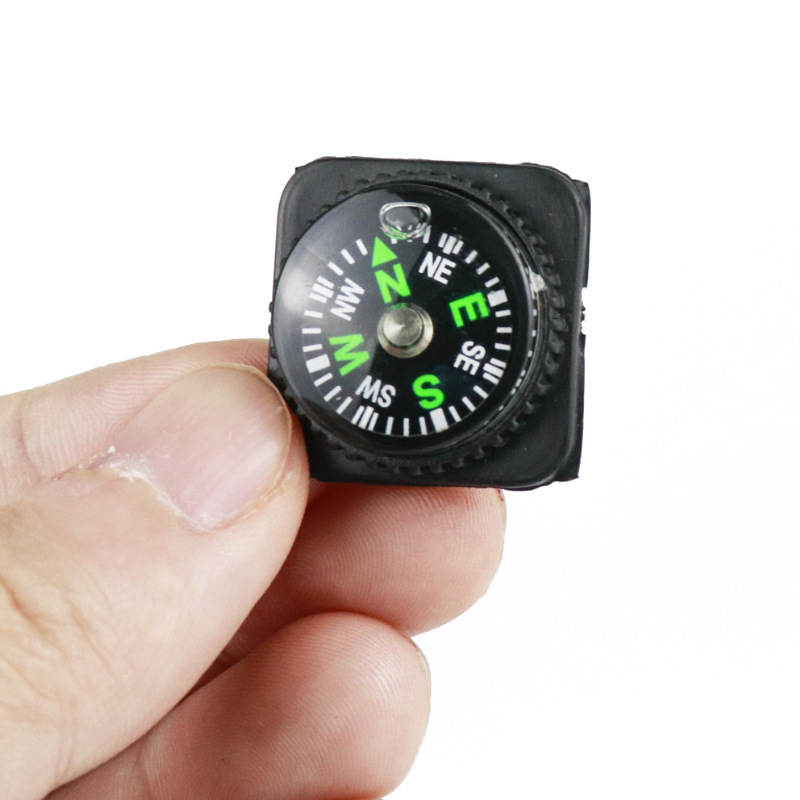 Ventas directas de la fábrica en stock 25mm plástico respetuoso del medio ambiente cubierta suave brújula pulsera al aire libre puntero aguja