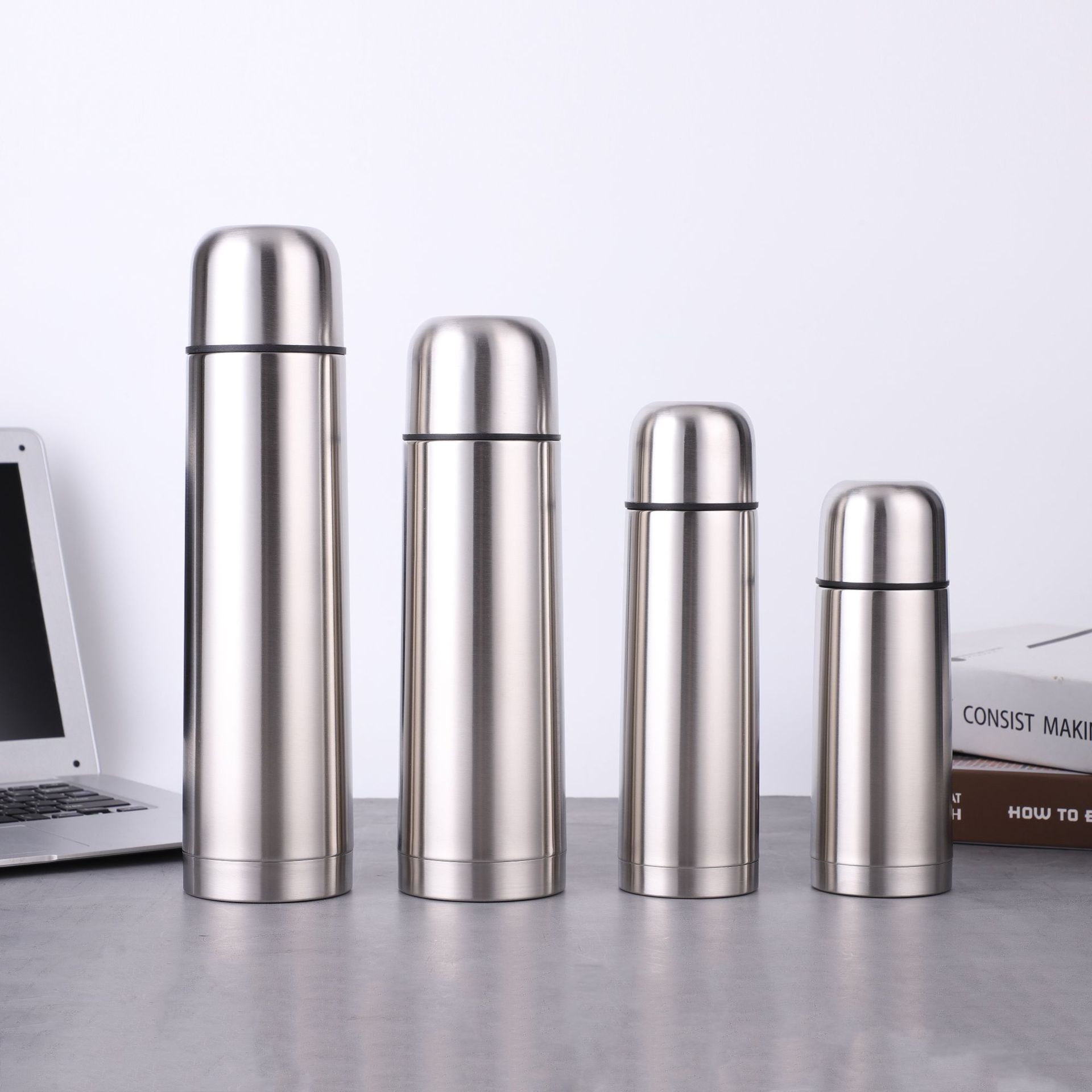 Venta al por mayor de acero inoxidable de doble capa de vacío de bala taza de vacío portátil 1L de vacío de doble capa taza de regalo de comercio exterior