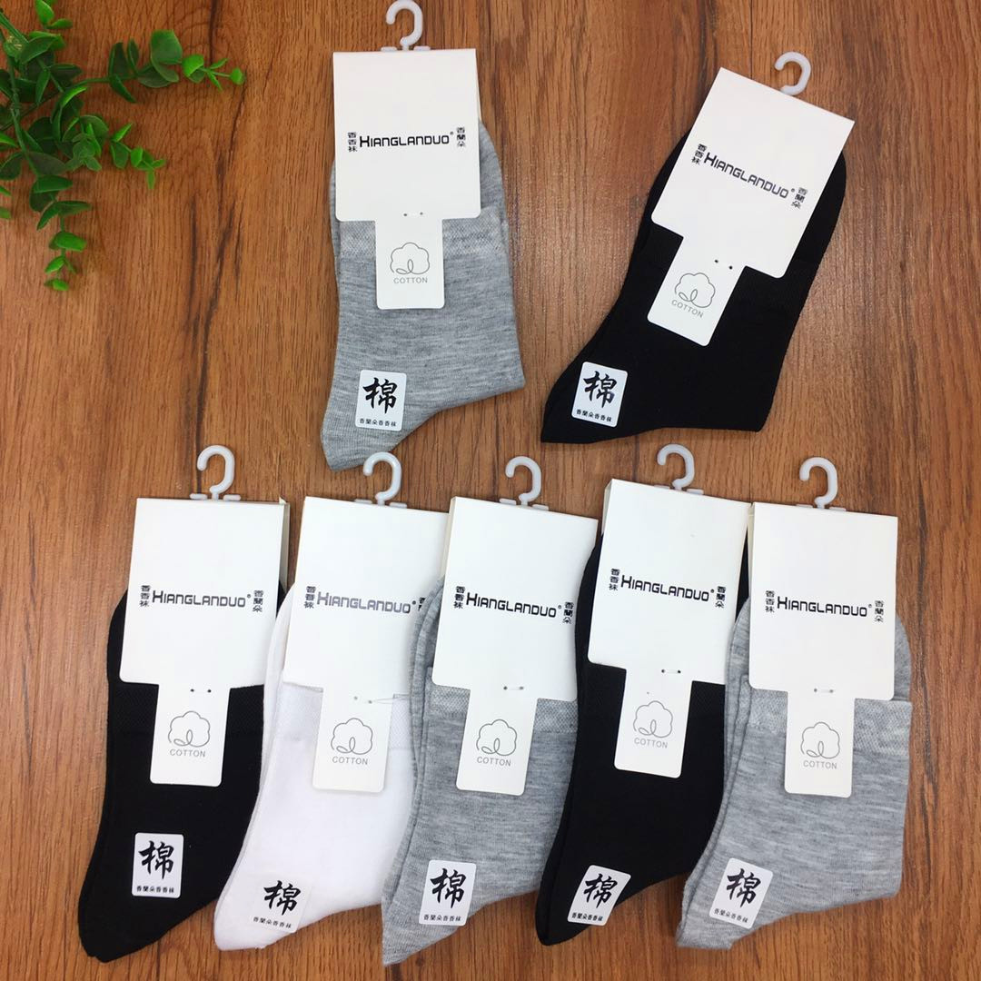 Solid color tube socks Four Seasons New Business men's socks Black and White boneless women's socks stall supply manufacturers wholesale