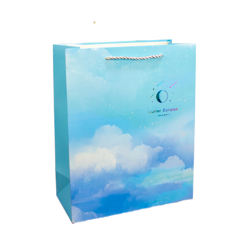 Creativo simple regalo de la mano bolsa de regalo de boda ins estilo cielo estrellado caja de regalo bolsa de papel portátil de protección del medio ambiente