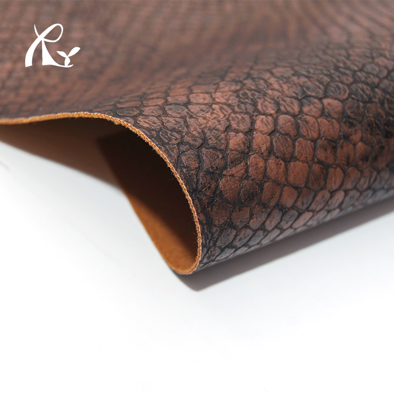 工厂批发环保鳄鱼纹pu皮革箱包鞋材人造革0.9mm厚仿皮料皮革面料