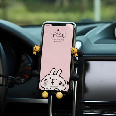 Cartoon car mobile phone holder cute car air outlet gravity mobile phone holder creative car retractable mobile phone holder