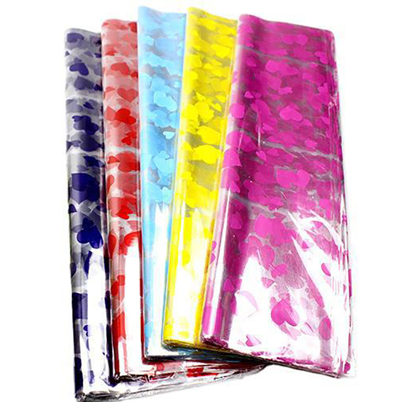 Flor envuelta en celofán impresión papel de plástico papel de regalo papel de embalaje transparente de Apple regalo flor material de embalaje al por mayor