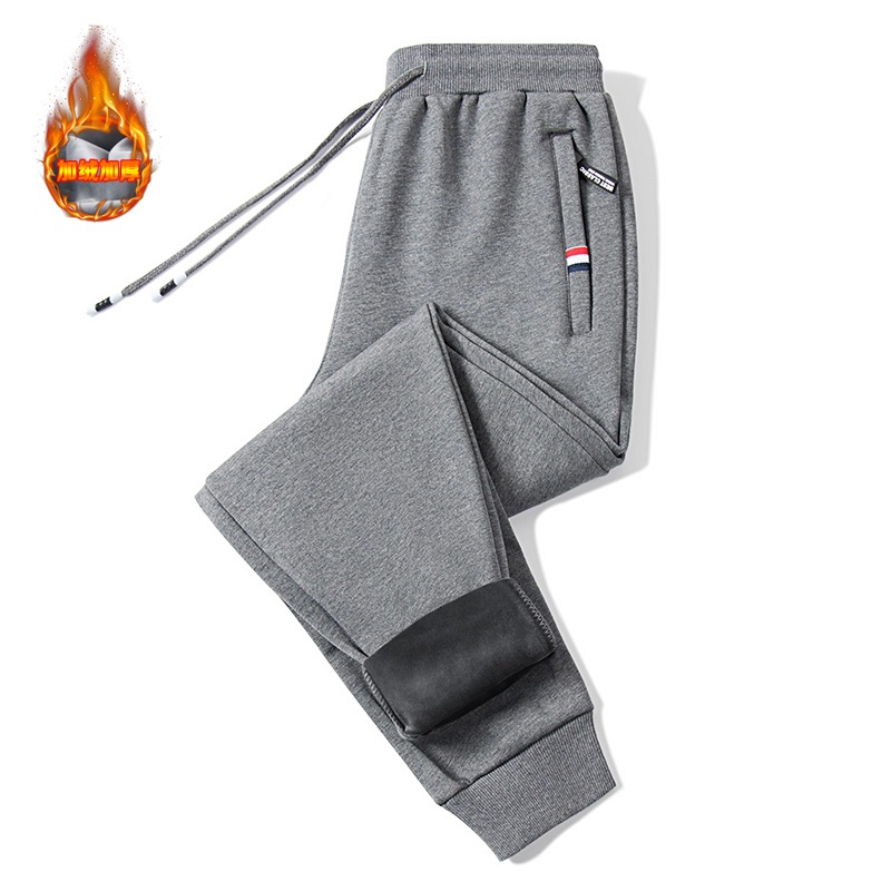 Pantalones deportivos de invierno de algodón para hombres más tamaño pantalones casuales gruesos forrados de lana pantalones casuales sueltos de bolsillo con cremallera atados al tobillo pantalones de hombre