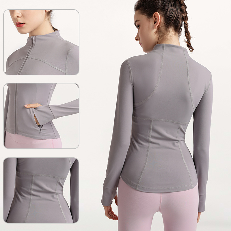 Primavera y otoño transfronterizos deportes slimming mangas largas mujeres ocio grueso bolsillo chaqueta de yoga secado rápido con cremallera ropa de yoga al por mayor