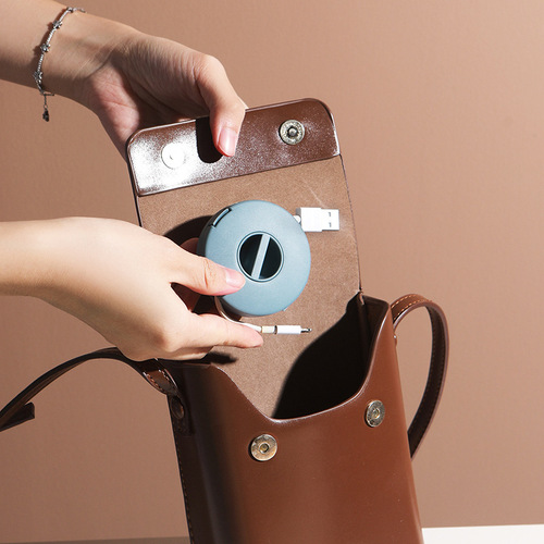 Compact and portable cable winder, mobile phone charging cable, data cable organization and storage box, round rotary cable take-up and cable organizer