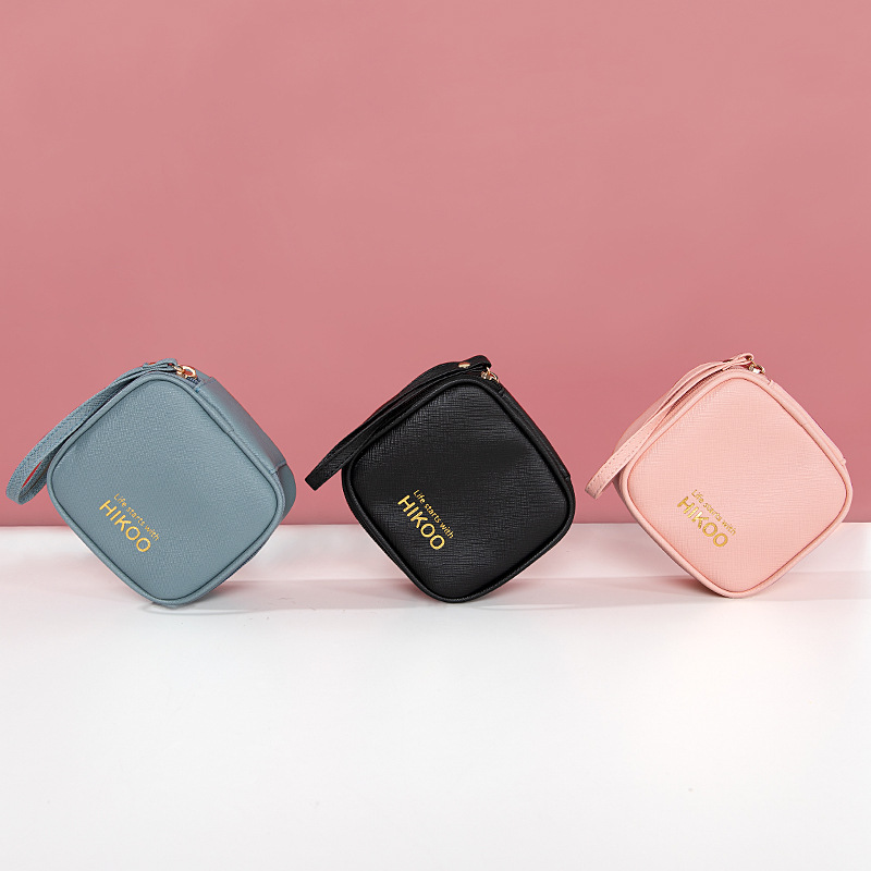 Bolsa de almacenamiento de servilletas sanitarias de suministro transfronterizo mensual portátil PU servilleta sanitaria pequeña bolsa cuadrada impermeable tía toalla bolsa de salud