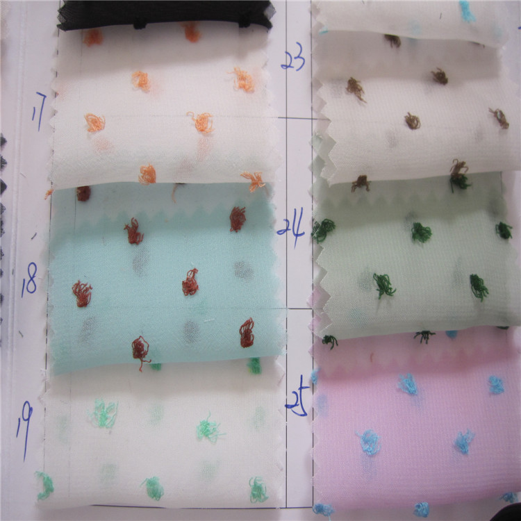 厂家直供春夏新款雪纺剪花面料 女装时装服装布料 现货批发