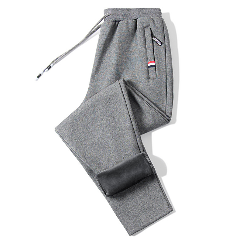 Pantalones deportivos de invierno de algodón para hombres más tamaño pantalones casuales gruesos forrados de lana pantalones casuales sueltos de bolsillo con cremallera atados al tobillo pantalones de hombre