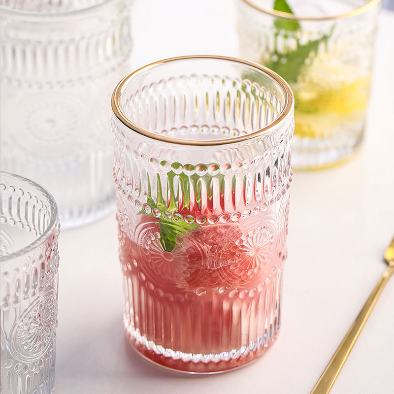 Suministro directo de fábrica ins Estilo nórdico alivio vintage borde dorado vidrio taza de agua taza de bebida de jugo de girasol