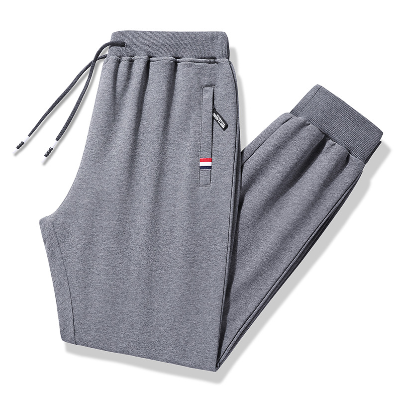 Pantalones deportivos de invierno de algodón para hombres más tamaño pantalones casuales gruesos forrados de lana pantalones casuales sueltos de bolsillo con cremallera atados al tobillo pantalones de hombre